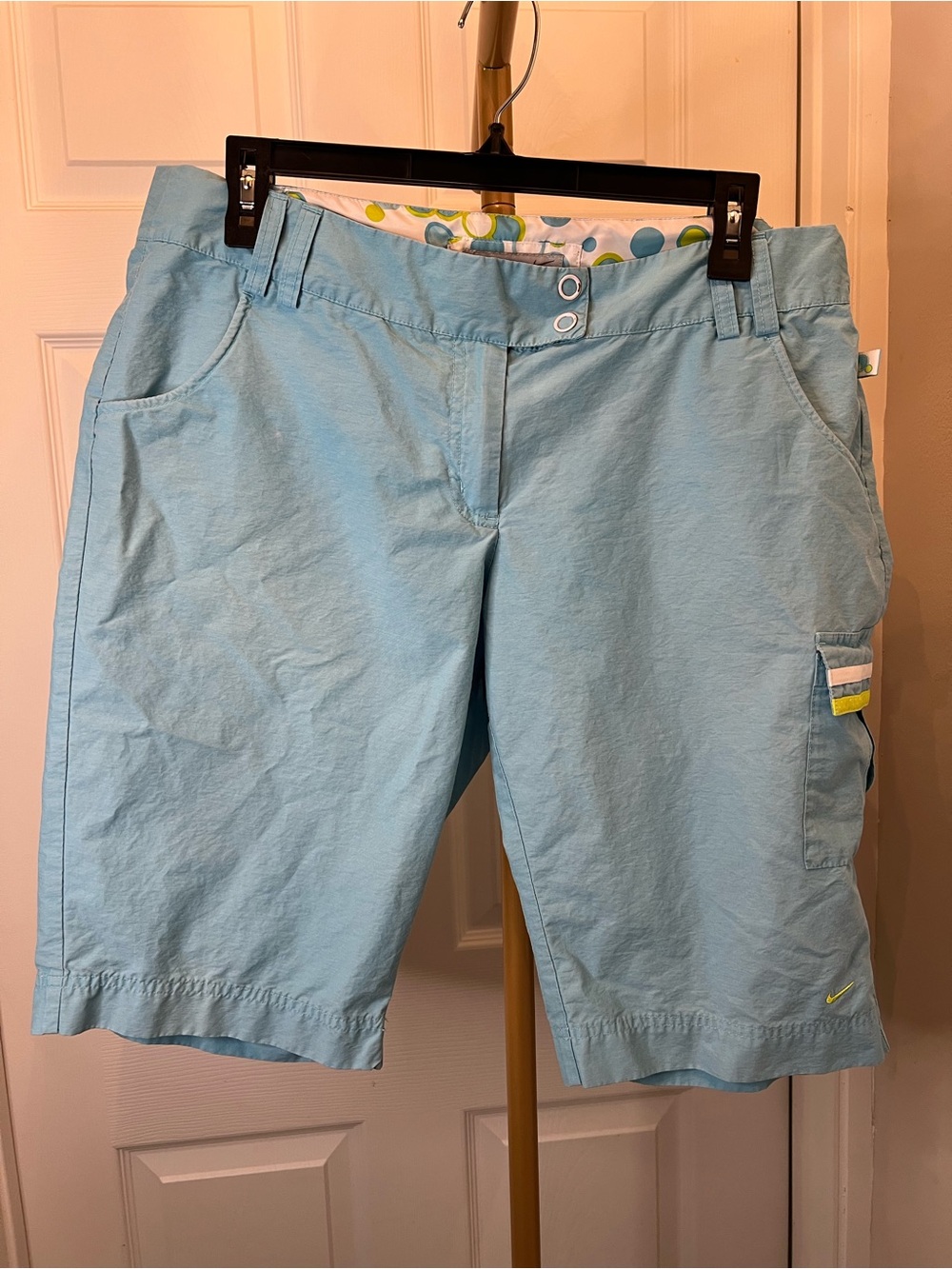 Nike Light Blue Women's Bermuda gold Shorts.